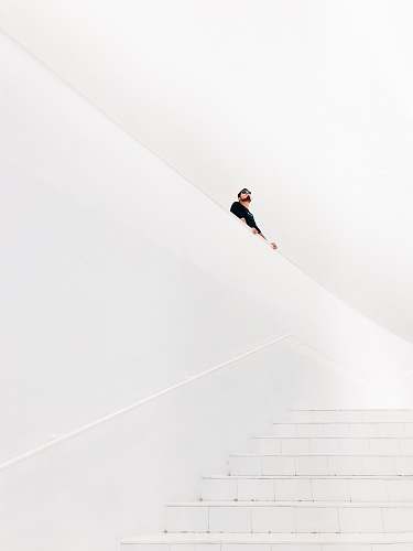 mexico city man looking up near stairs mexico